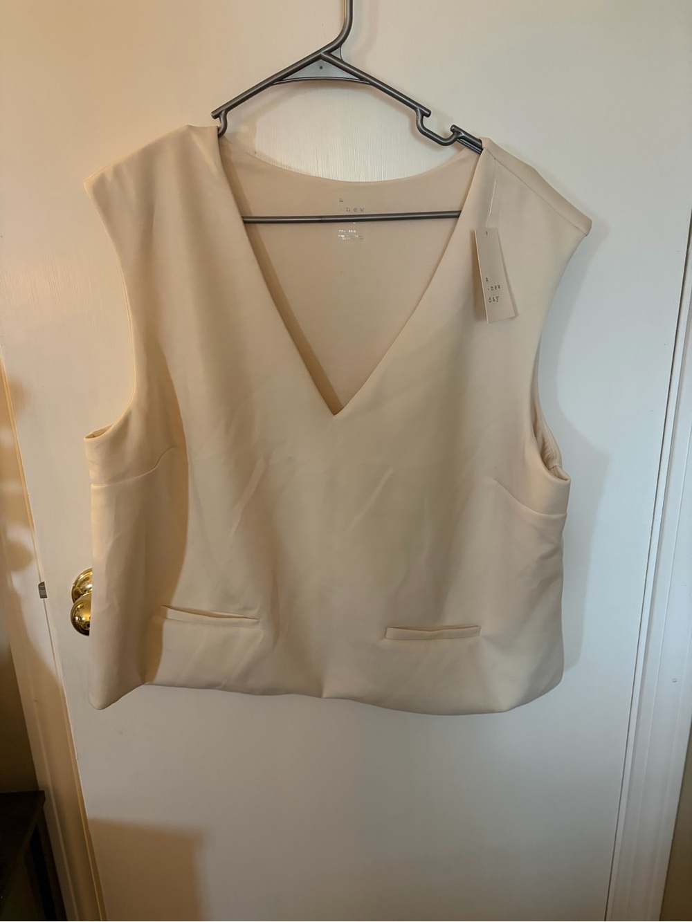 V-Neck Sleeveless Tank Top in Cream by Unknown